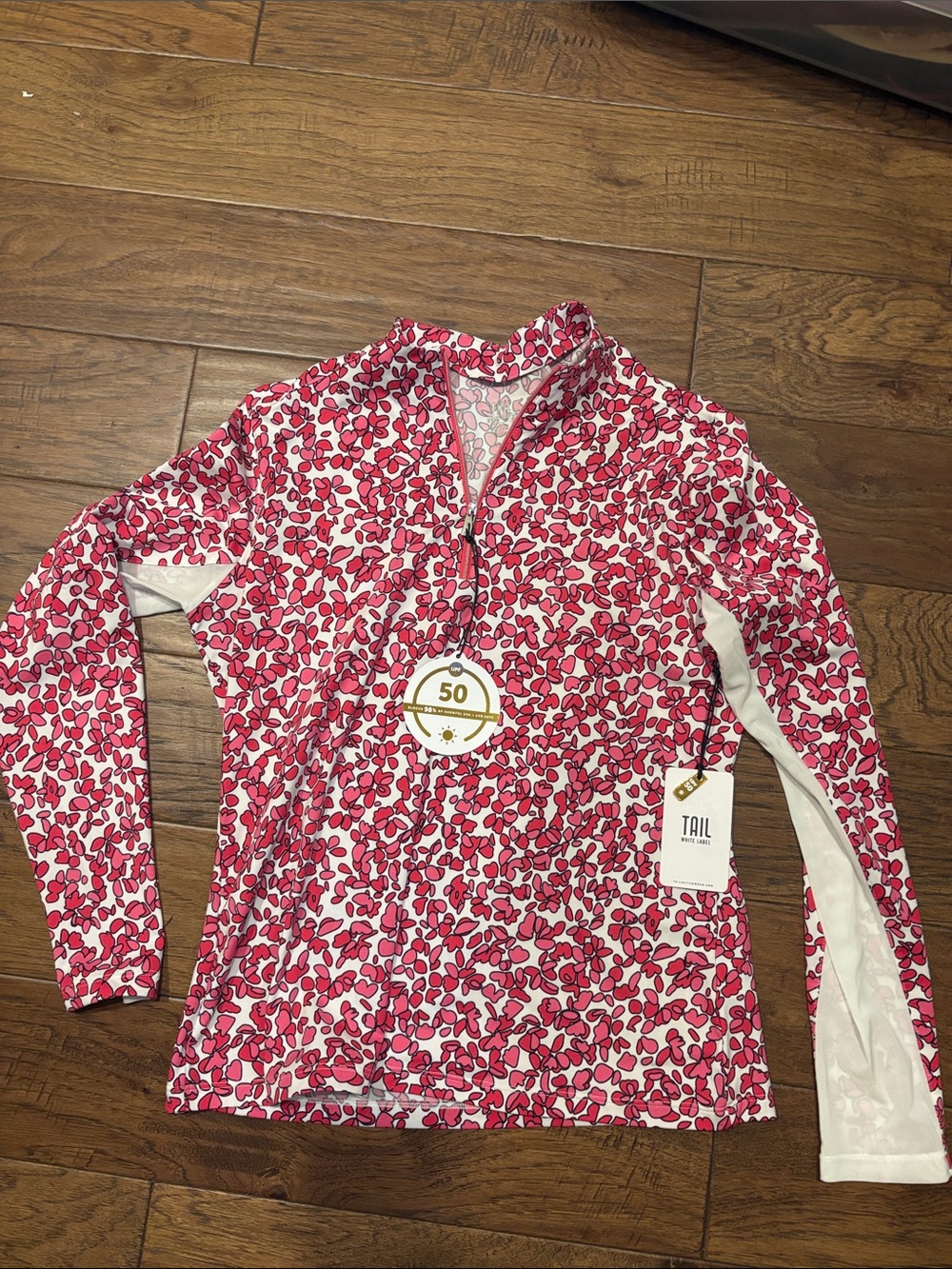 TAIL Women’s UPF 50 Pink Floral Half-Zip Performance Top